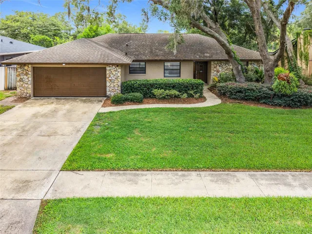 Mature landscaping with sprinkler system