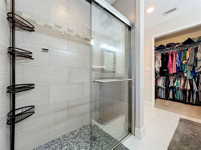 Remodeled shower in owner's en-suite.