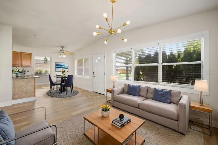 Virtually staged living room and dining area