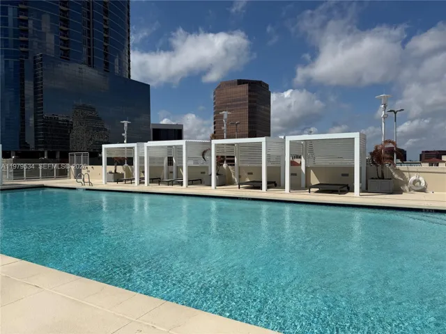 pool cabanas overlooking lake