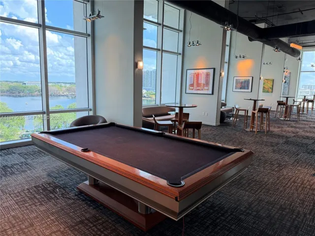 Pool table next to theatre room
