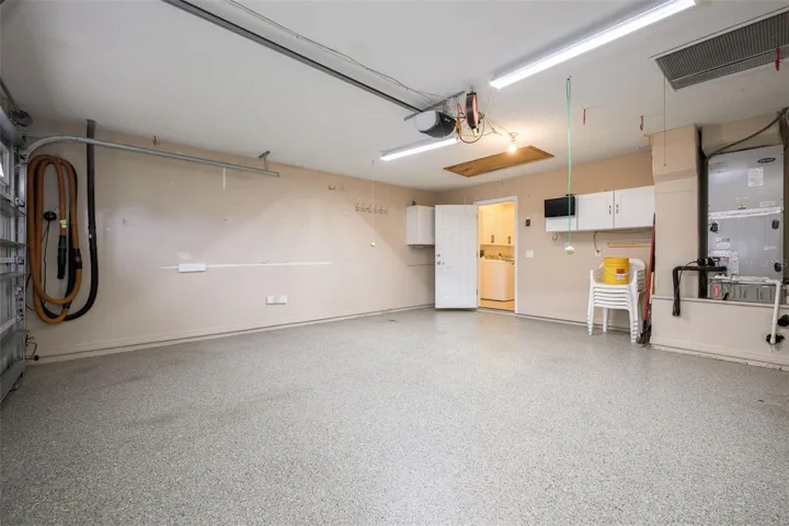 Garage with Shark Coated floor & Central Vac System