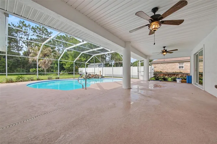 Enjoy the large screened lanai and beautiful pool, perfect for relaxing and entertaining