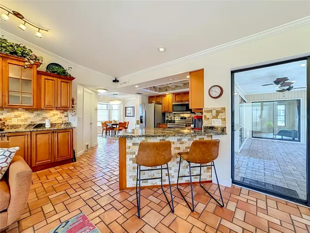 Additional cabinetry with wet bar