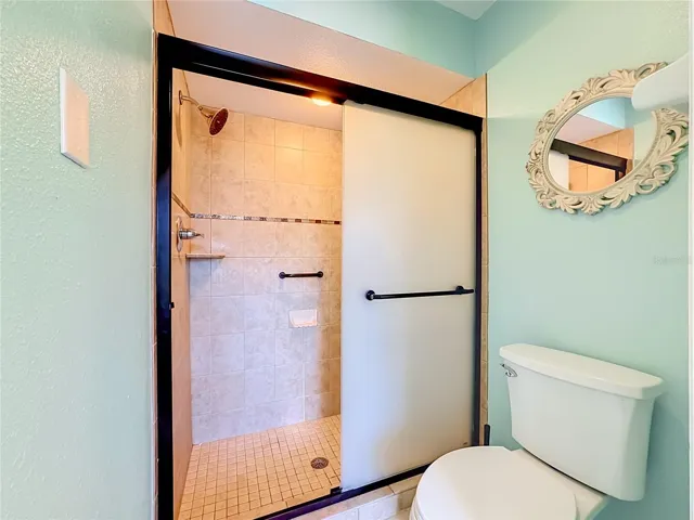 Shower and toilet have a separate private area from the vanities