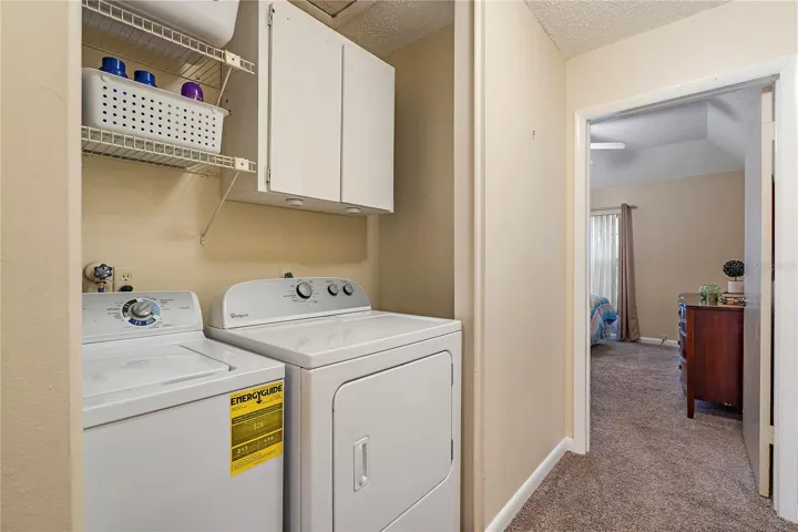 Side by side washer / dryer in hallway