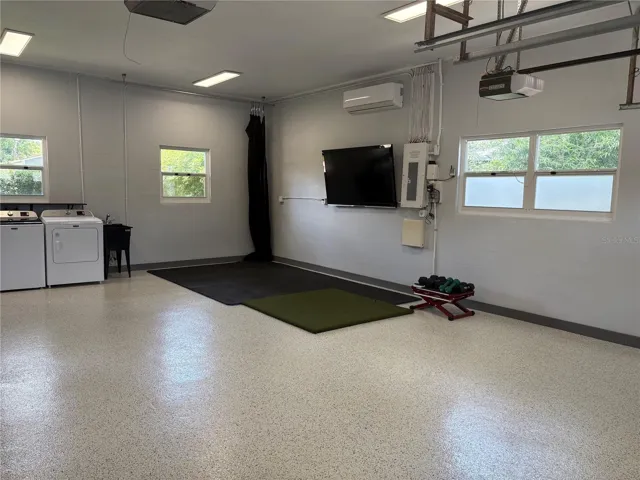 Oversized garage with epoxy floor coating
