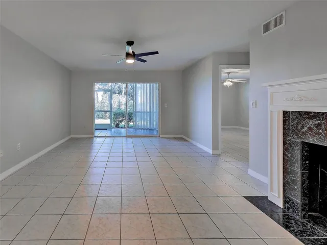 Living Area (note decorative fireplace), Lanai