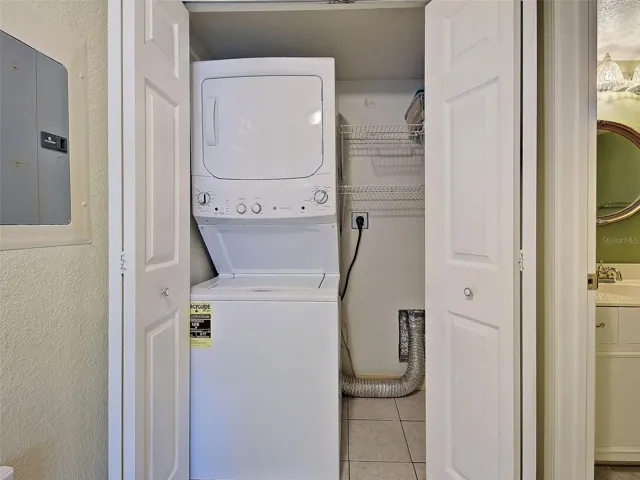 Laundry Closet with stackable washer & dryer, extra storage
