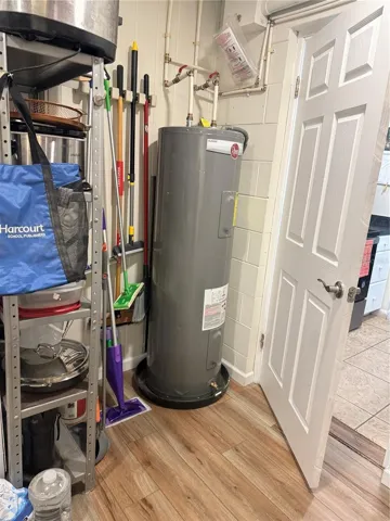 laundry area and storage right off kitchen area
