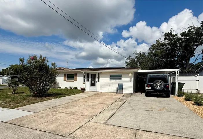 Freshly painted exterior, carport with extra parking driveway