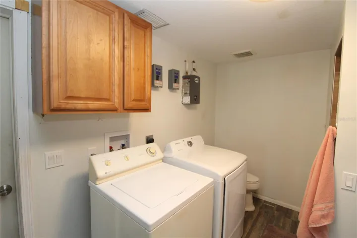 Apartment laundry room and bathroom...