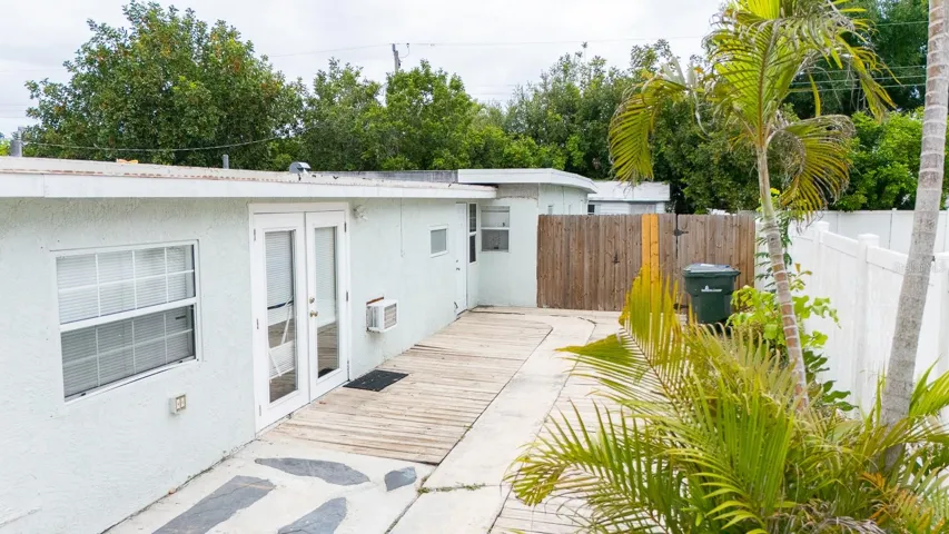Unit B Entrance. Door left of fence.