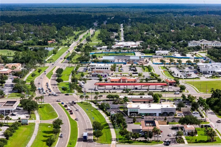 Commercial corridor along Sumter Boulevard featuring shopping, restaurants, and professional services.