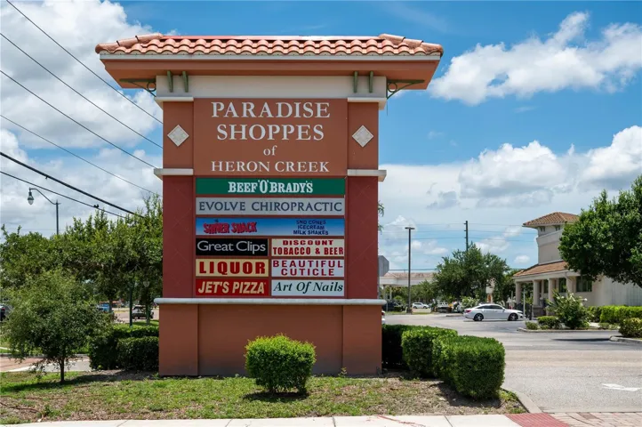 Paradise Shoppes at Heron Creek featuring dining, personal services, and everyday conveniences.