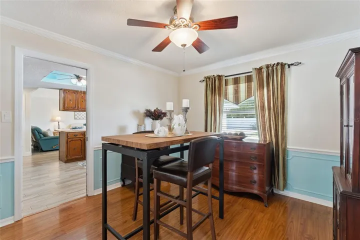 Dining Room sits comfortably between the kitchen/family room combo and the master bedroom. All rooms have ceiling fans.