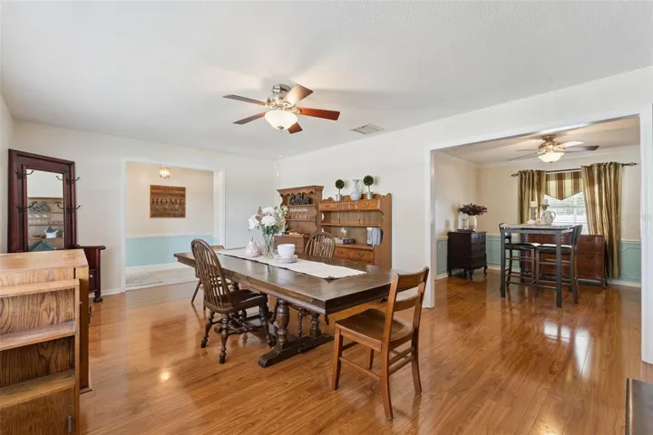 Formal Dining Room/Flex Space leads into the casual dining room which is between the kitchen and master bedroom.