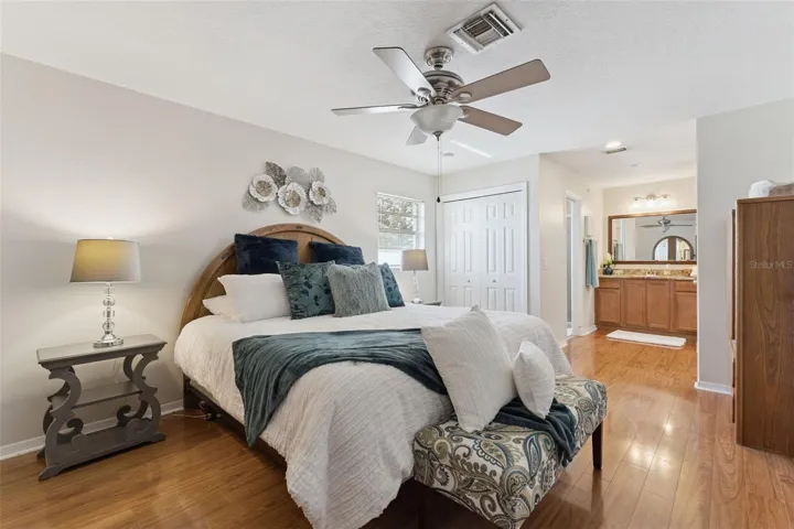 Master bedroom has a vanity outside of the water closet with walk-in shower.