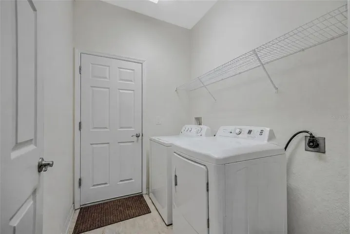 Inside laundry room.
