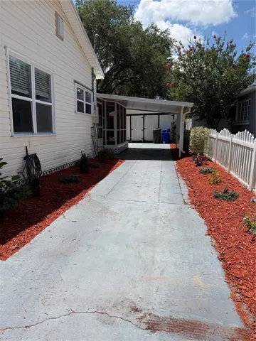 Carport area and screened porch