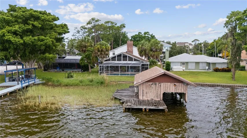 Rear with Boat House - Lake Frontage