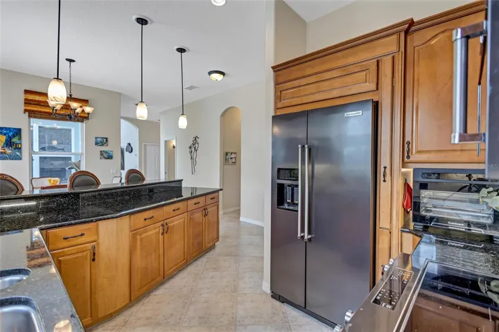 Kitchen well-equipped to entertain guests and stay engaged with them the entire time.