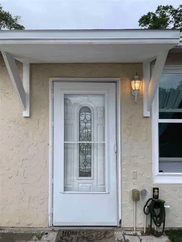 Secon efficiency unit entrance by pool