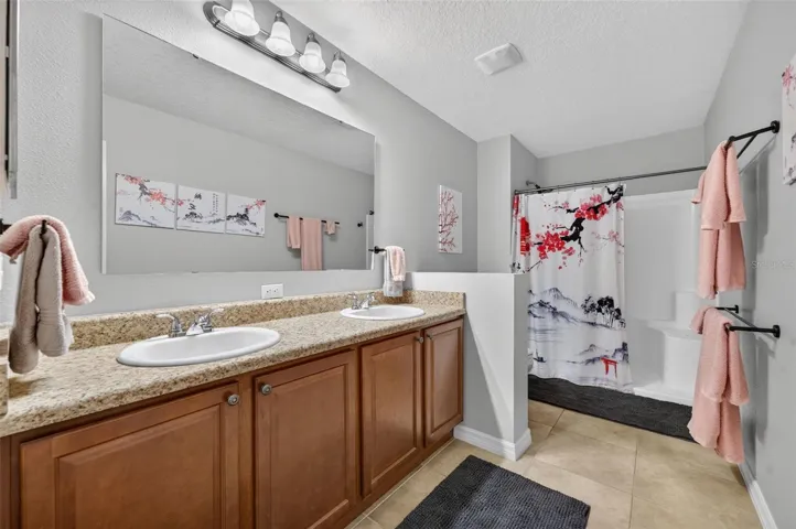 Upstairs Bathroom | Full upstairs bathroom conveniently serving secondary bedrooms and loft area.