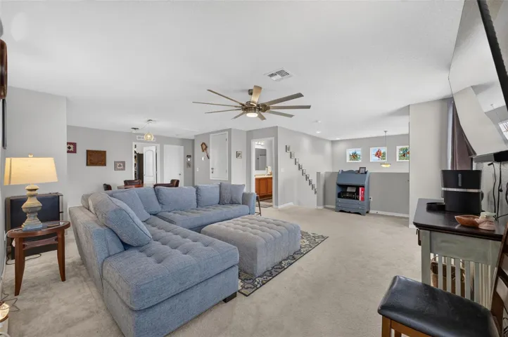 Loft Living Area | Expansive second-floor gathering space providing additional room to relax and entertain.