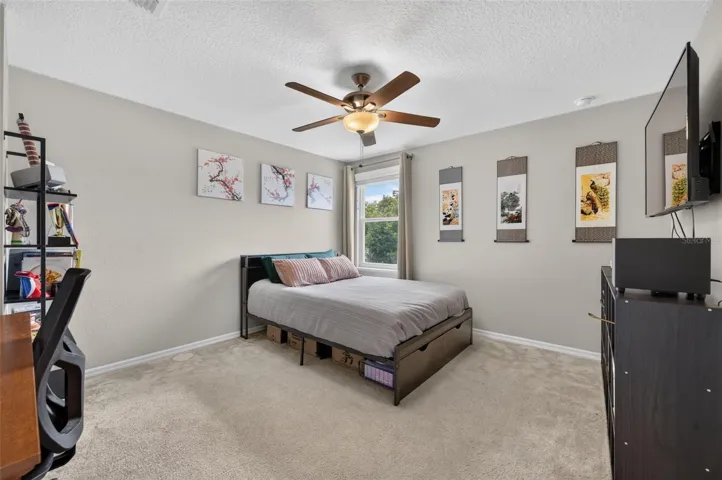 Fourth Bedroom | Comfortable bedroom with versatile use potential.