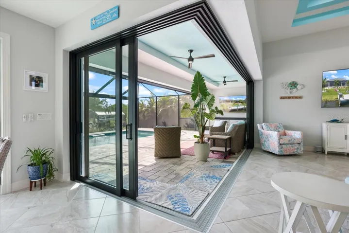 Pocket Sliders Open to Lanai and Heated Custom Pool
