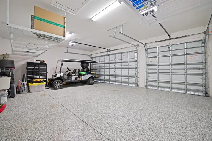 True Three-Car Garage With Custom Storage Rack System