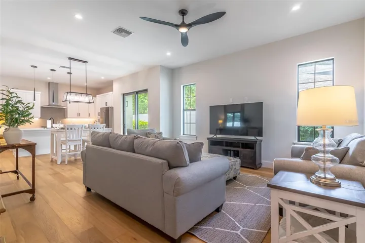 From the front entrance, you look through the living space to the dining an kitchen.