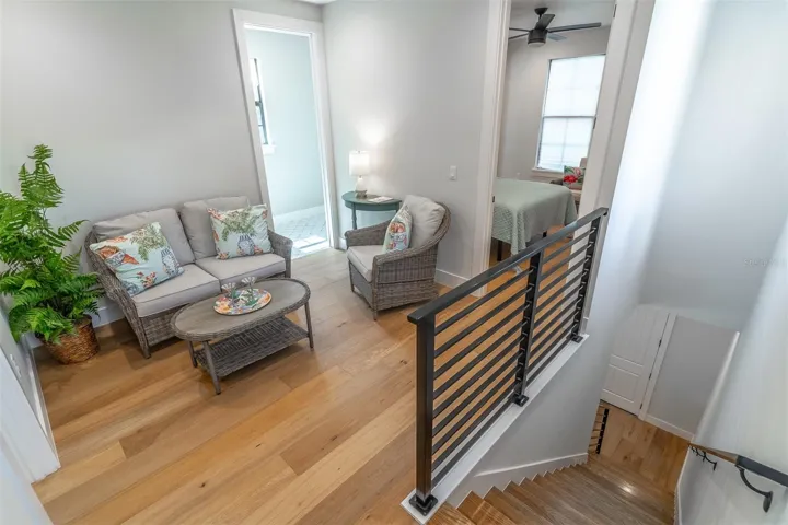 Second floor sitting area. Bedroom 2 to the right and laundry room to the left.