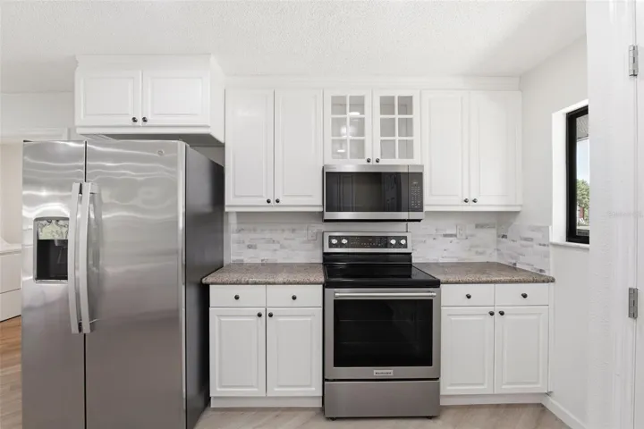 Kitchen with Stainless Steel Appliances and plenty of Countertop Space