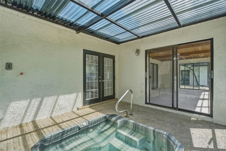 In Ground Jacuzzi with Screened in Lanai