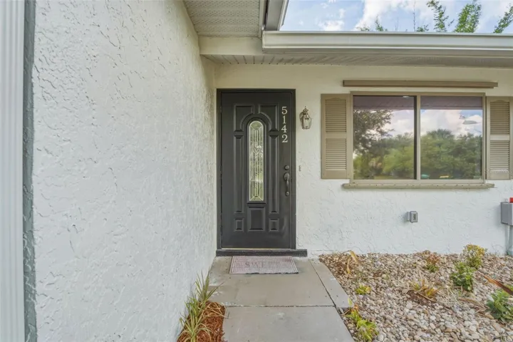 inviting Front Entry with Hurricane Rated Front Door
