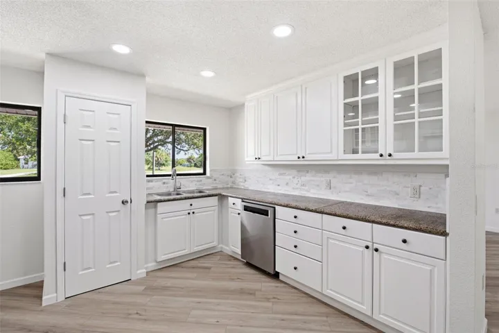 Kitchen with Two Windows and Food Pantry