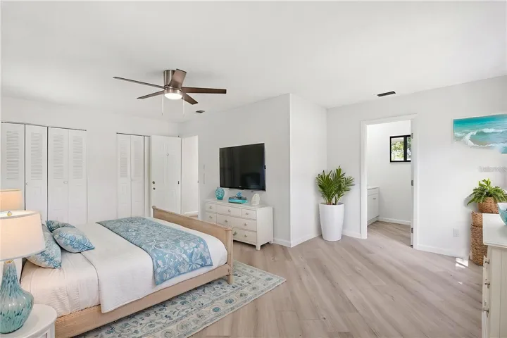 Primary Bedroom with two Closets and TV Wall