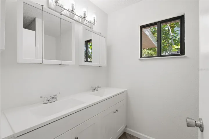 Primary on Suite Bathroom with His and Hers Sink plus Walk in Shower