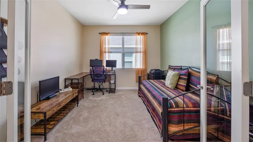 This room could be used as a bedroom, den or office.