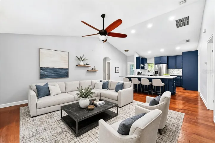 Inside, WOOD &amp; TILE FLOORING flow throughout the home, complementing the bright and open design. Virtually Staged.