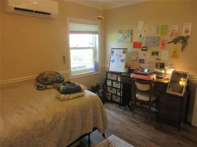lower story bedroom number one / PELLA WINDOW