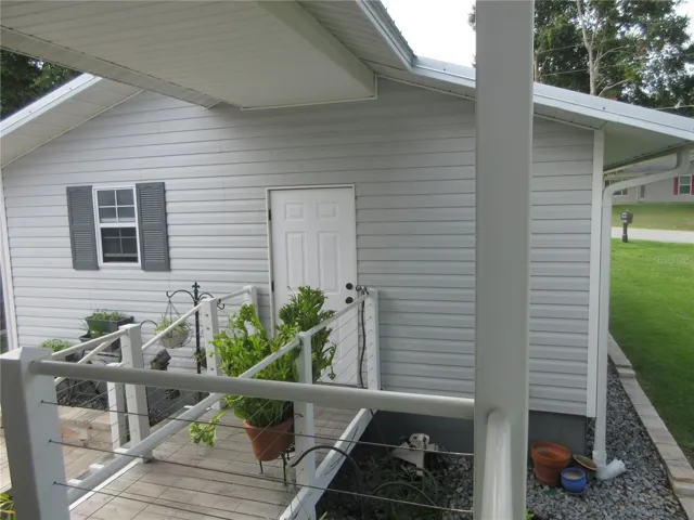 breezeway connecting to 2 car garage / bath
