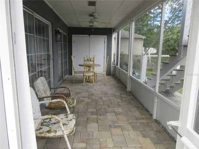 bottom story screened veranda / storage room
