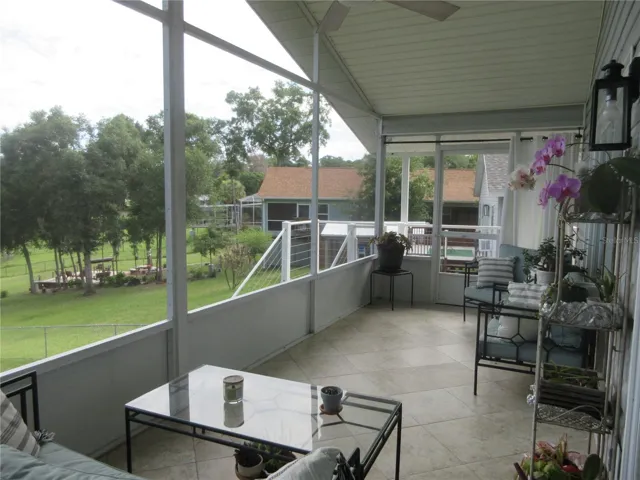 2nd story screened veranda / tiled flooring