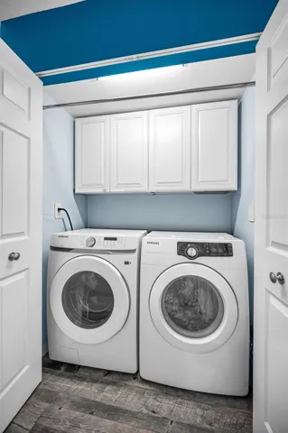 Main level Utility closet with full sized washer & dryer