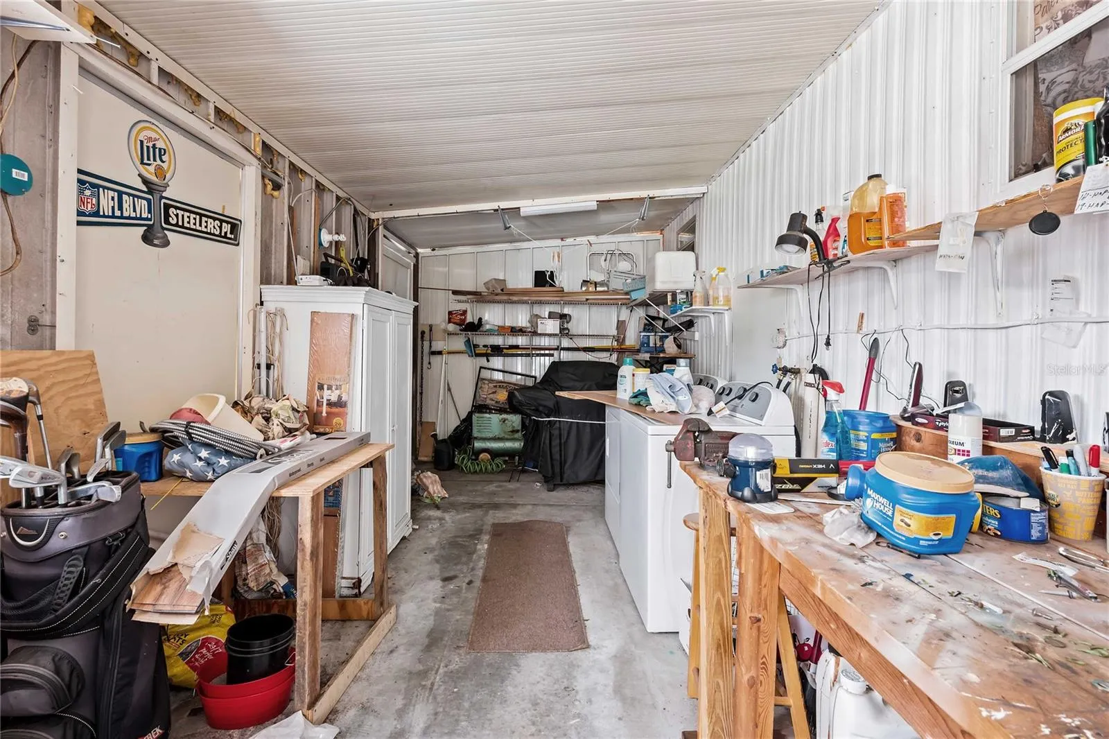 Laundry area and workshop.