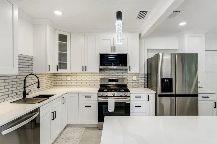 Updated kitchen with gas range