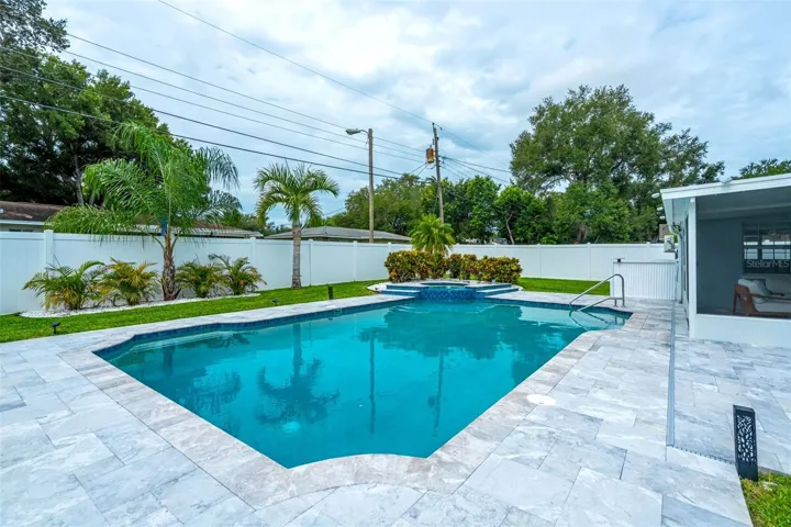 Newly resurfaced gas heated pool and spa and new pavers